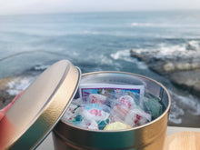 Load image into Gallery viewer, Enlighten Me...® Candy:  Gift Tin of Salt Water Taffy  (A dose of Rainbows) - with secret scroll inspirational messages
